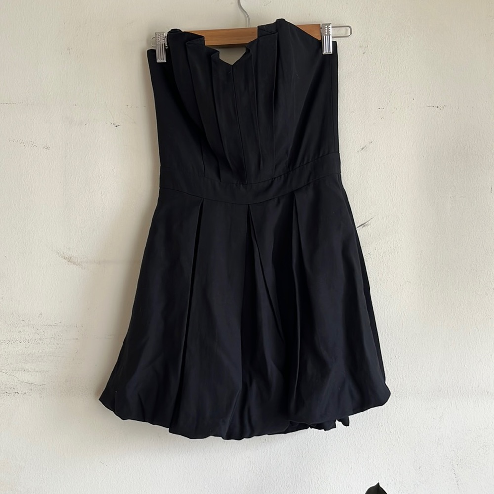 Pleated strapless black dress